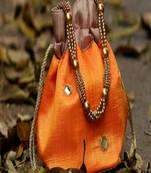 bagzVela Golden Orange Toned Real Mirror Work Silk Potli