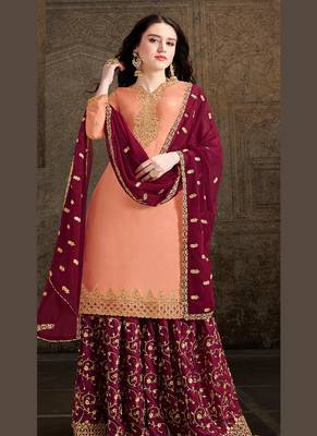 peach satin embroidered semi stitched top & bottom with dupatta 1