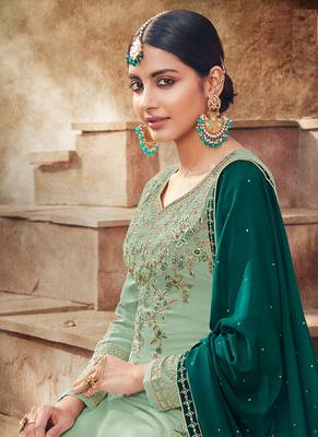 turquoise georgette embroidered semi stitched top & bottom with dupatta 2