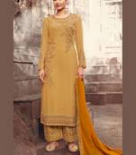 gold georgette embroidered semi stitched top & bottom with dupatta