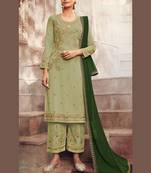 green georgette embroidered semi stitched top & bottom with dupatta