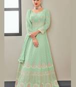 turquoise faux georgette embroidered semi stitched top & bottom with dupatta