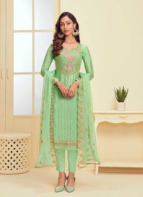 green georgette embroidered semi stitched top & bottom with dupatta 1