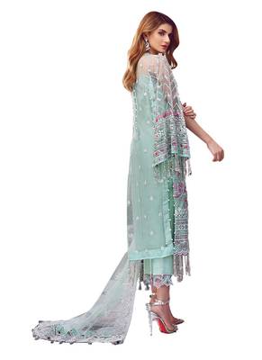 green net embroidered semi stitched top & bottom with dupatta 2