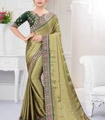 Dark green embroidered fancy fabric saree with blouse