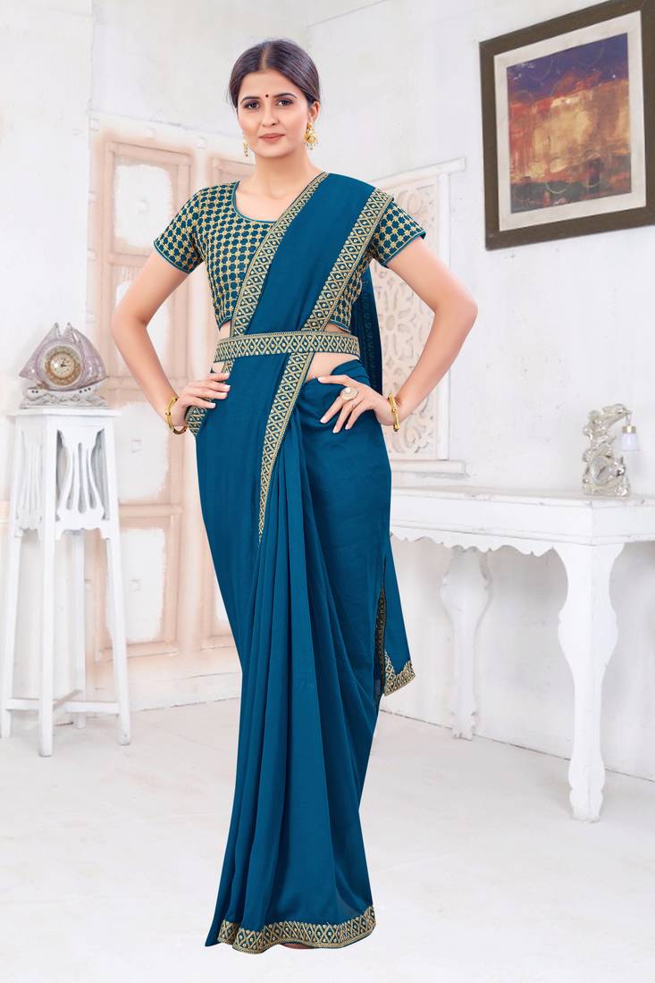 Green embroidered fancy fabric saree with blouse