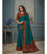 Turquoise printed chiffon saree with blouse