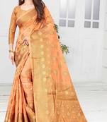Peach woven cotton saree with blouse