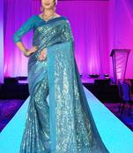 Turquoise embroidered silk saree with blouse