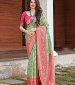 Light green woven banarasi silk saree with blouse