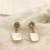 White pearl earrings