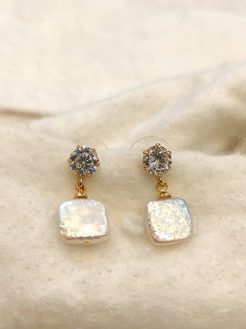 White pearl earrings