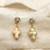 Gold pearl earrings