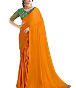 Orange plain chiffon saree with blouse