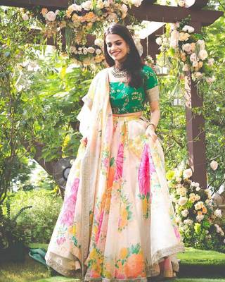 Engrossing Cream Floral Designer Lehenga with rich embroidered Green Blouse and Dupatta 1