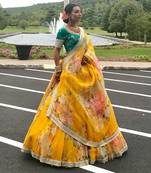 Yellow Floral Organza Lehenga with Green Embroidered Choli