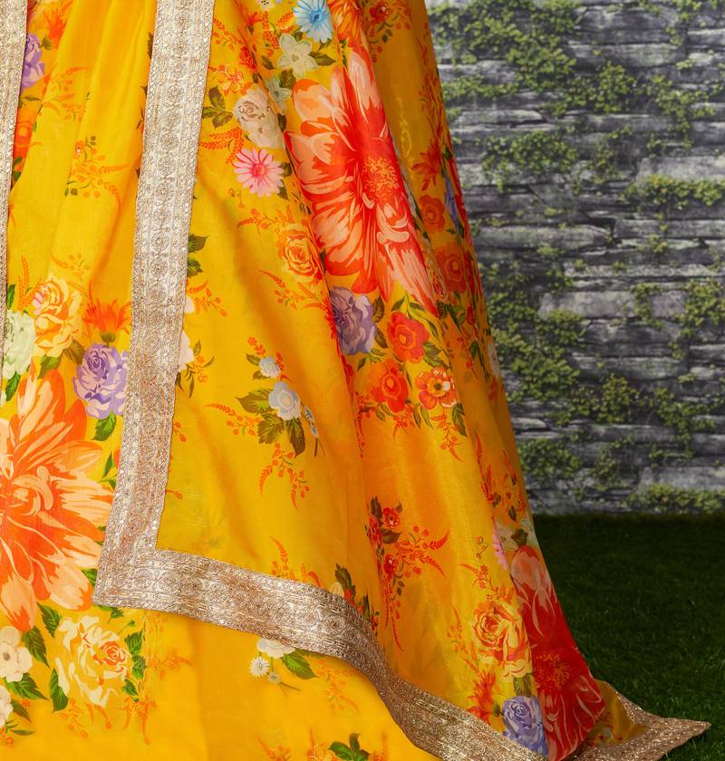 Yellow Floral Organza Lehenga with Green Embroidered Choli