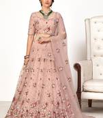 Enchanting Pink embroidered net wedding ghagra choli with dupatta