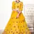 Yellow embroidered net semi stitched ceremonial lehenga