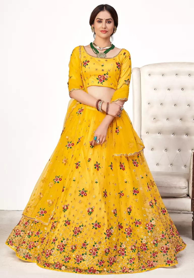 Yellow embroidered net semi stitched ceremonial lehenga