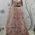 Pink embroidered net semi stitched wedding lehenga