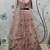 Pink embroidered net semi stitched wedding lehenga