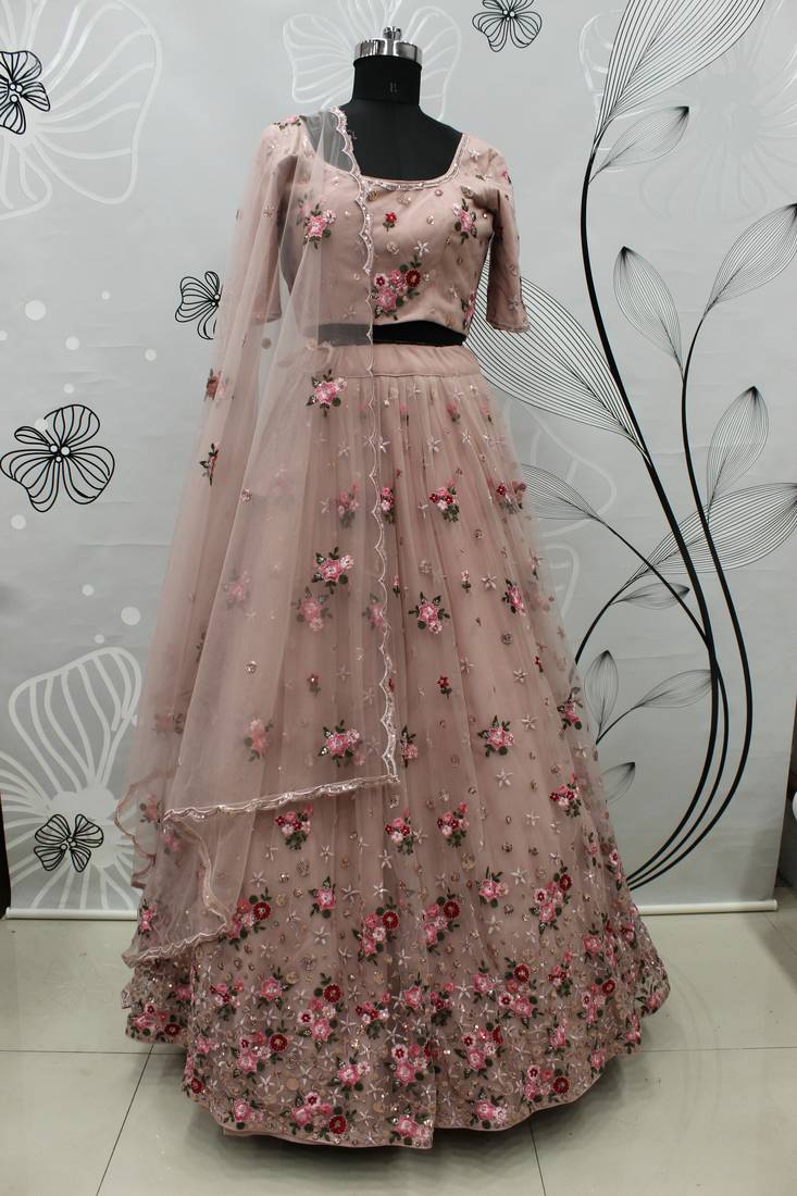 Pink embroidered net semi stitched wedding lehenga