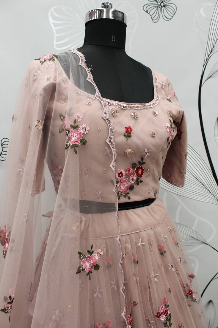 Pink embroidered net semi stitched wedding lehenga