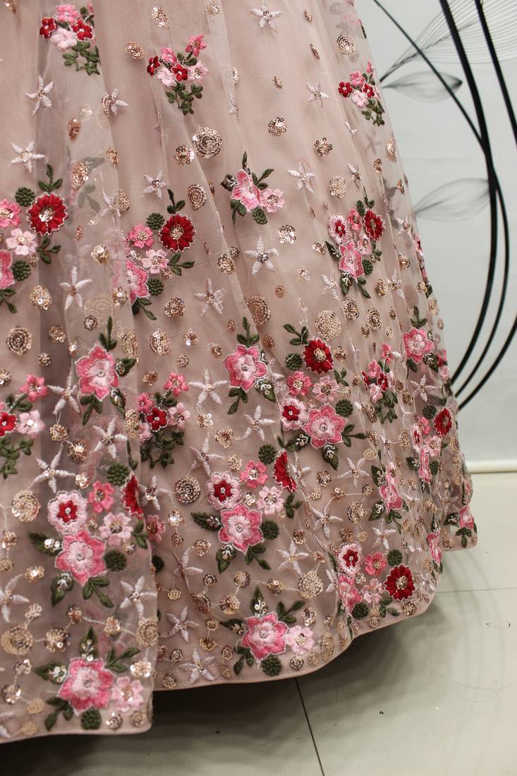 Pink embroidered net semi stitched wedding lehenga