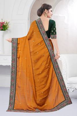 Yellow embroidered fancy fabric saree with blouse 4