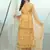 Yellow embroidered net salwar