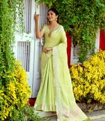 Orange woven tissue saree with blouse