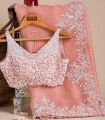 Peach embroidered organza saree with blouse