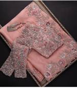 Peach embroidered organza saree with blouse