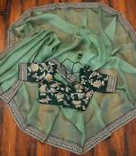 Green embroidered organza saree with blouse