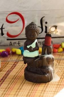 eCraftIndia Meditating Monk Buddha DECORative Showpiece with 10 free Smoke Backflow Scented Cone Incenses