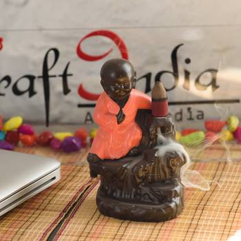 eCraftIndia Karate Style Monk Buddha DECORative Showpiece with 10 free Smoke Backflow Scented Cone Incenses 1