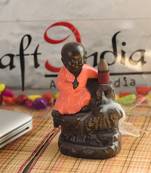 eCraftIndia Karate Style Monk Buddha DECORative Showpiece with 10 free Smoke Backflow Scented Cone Incenses