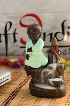 eCraftIndia Karate Style Monk Buddha DECORative Showpiece with 10 free Smoke Backflow Scented Cone Incenses
