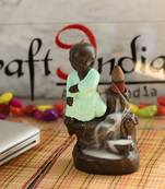 eCraftIndia Karate Style Monk Buddha DECORative Showpiece with 10 free Smoke Backflow Scented Cone Incenses