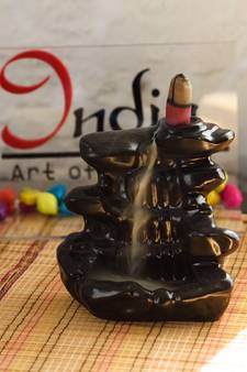 eCraftIndia Dropping Fountain Design DECORative Showpiece with 10 free Smoke Backflow Scented Cone Incenses