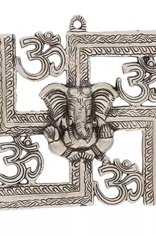 silver metal wall hanging with ganesha figurine and om-symbol motif