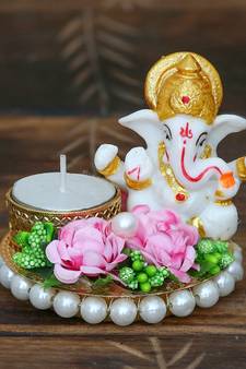 eCraftIndia Lord Ganesha Idol on DECORative Plate with Tea Light Holder