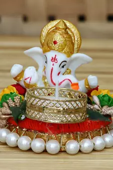 eCraftIndia Lord Ganesha Idol on DECORative Plate with Tea Light Holder