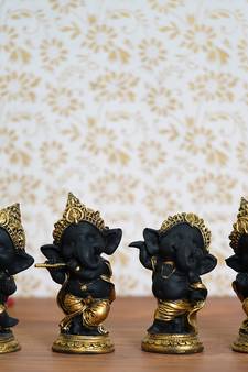 eCraftIndia Set of 4 Golden and Black Lord Ganesha Dancing Avatar DECORative Showpiece