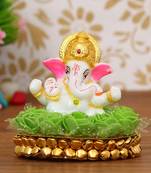 eCraftIndia Lord Ganesha Idol on DECORative Handcrafted Plate with Green Flowers