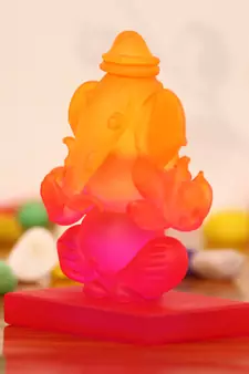 eCraftIndia Pink and Orange Double Sided Crystal Car Ganesha Showpiece