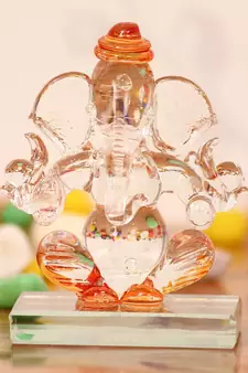 eCraftIndia Orange and Transparent Double Sided Crystal Car Ganesha Showpiece