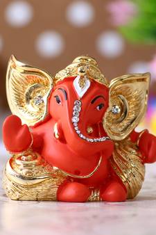 eCraftIndia Gold Plated Orange Kaan Ganesha DECORative Showpiece for Home Temple Office Car Dashboard