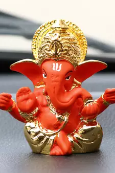 eCraftIndia Gold Plated Orange Mukut Ganesha DECORative Showpiece for Home Temple Office Car Dashboard